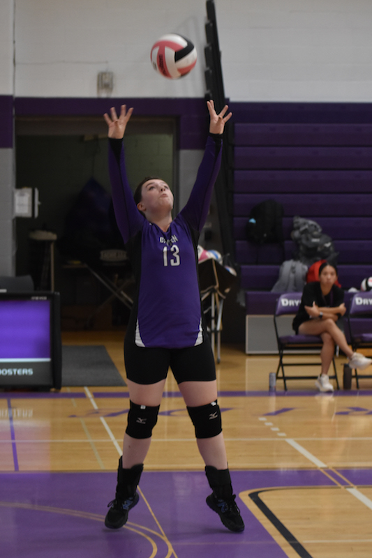 Celia as setter on the JV volleyball court